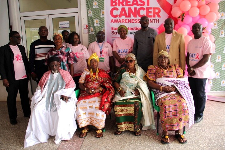Community leaders and hospital representatives in a group photograph