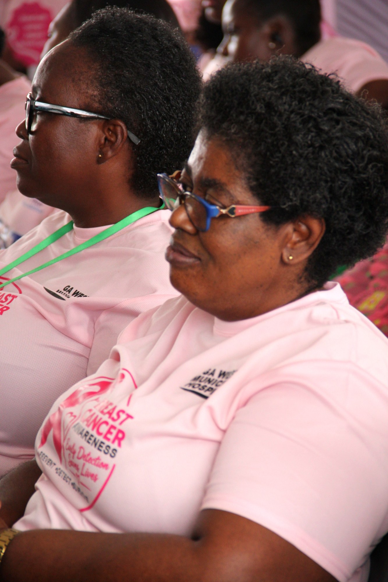 Participants listening attentively during the awareness event
